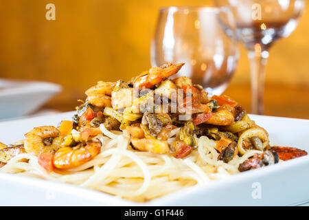 Seafood and pasta dish at a restaurant. Bombinhas, Santa Catarina, Brazil. Stock Photo