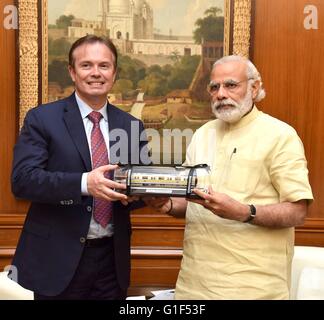 Indian Prime Minister Narendra Modi meets with Laurent Troger, Global President, Bombardier Transportation, at his residence at Race Course Road May 10, 2016 in New Delhi, India. Stock Photo