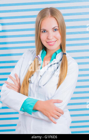 MODEL RELEASED. Laboratory assistant smiling towards camera, portrait. Stock Photo
