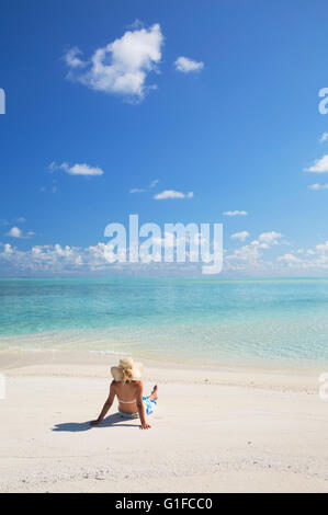 Woman on sandbank, South Male Atoll, Kaafu Atoll, Maldives Stock Photo