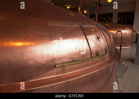 Traditional Copper tanks for brewing Heineken beer at the Heineken Museum in Amsterdam, Holland, Netherlands. Stock Photo