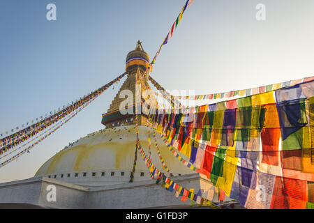 Boudhanath Stupa with hundreds of Pigeons and Prayer flags in Kathmandu, Nepal Stock Photo