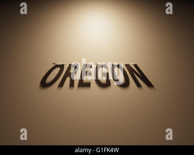 A 3D Rendering of the Shadow of an upside down text that reads Oregon. Stock Photo