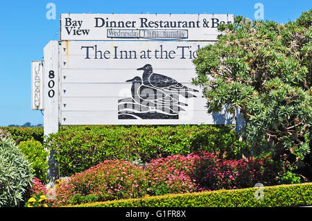 California: sign of The Inn at the Tides in Bodega Bay, a restaurant in Bodega Bay, famous for being the set of The Birds, Alfred Hitchcock's movie Stock Photo