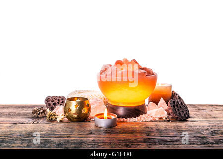 Still life of turned on Himalayan pink salt lamp Stock Photo