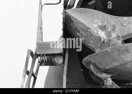 black and white detail of a concrete mixer truck parts Stock Photo