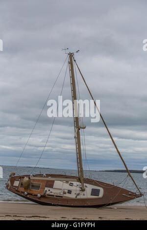 beached sailboat at Haven's Beach, Sag Harbor, NY Stock Photo