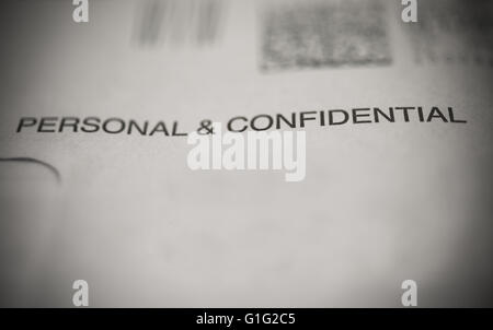 envelope marked with personal & confidential Stock Photo