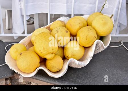 A bowl of large lemons on Capri island Stock Photo