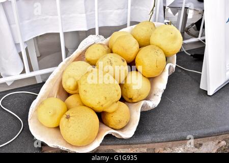 A bowl of large lemons on Capri island Stock Photo