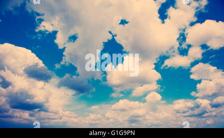 White fluffy clouds over blue sky Stock Photo