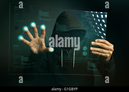 Fingerprint identification app on futuristic tablet computer device, hooded computer hacker hacking biometric security internet Stock Photo