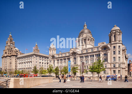 The 'Three Graces', historic buildings which dominate the Liverpool waterfront at Pier Head. They are the Royal Liver Building, Stock Photo