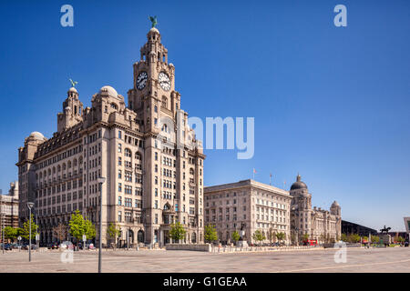 The 'Three Graces', historic buildings which dominate the Liverpool waterfront at Pier Head. They are the Royal Liver Building, Stock Photo