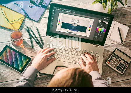 Graphic designer at work. Color swatch samples. Stock Photo