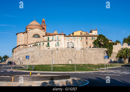 View from outside the wall with visible in the center the gate of the old city and the dome and tower bell of the town church. Stock Photo