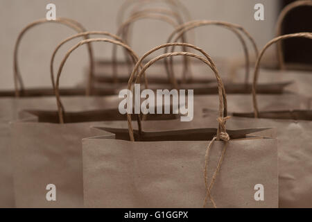 Set of bags with brown paper for holiday gifts Stock Photo