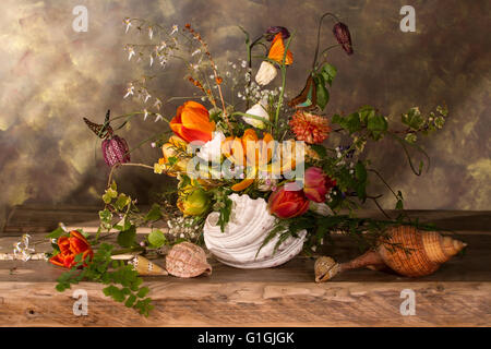 Shell with Flowers and Butterflies Stock Photo