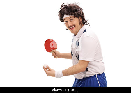 Young retro man playing table tennis and looking at the camera isolated on white background Stock Photo