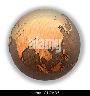 Southeast Asia on wooden model of planet Earth with embossed continents ...