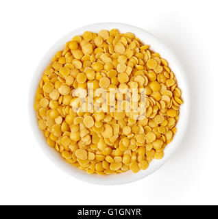 Bowl of yellow split lentil isolated on white background, top view Stock Photo