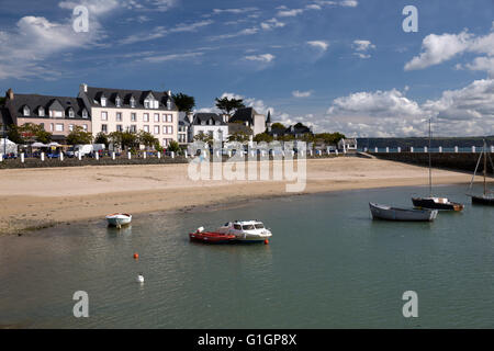 View of beach and boats in harbour, Locquirec, Finistere, Brittany, France, Europe Stock Photo