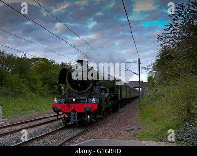 Wallyford, UK, 14 May 2016. The Flying Scotsman locomotive traveling to Edinburgh, Scotland through Wallyford station, East Lothian Stock Photo