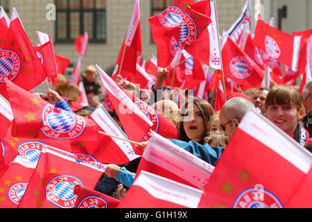 Fans wait for the FC Bayern Munich team to celebrate the 26th German Championships on Marienplatz square in Munich, Germany, 15 May 2016. Photo: KARL-JOSEF HILDENBRAND/dpa Stock Photo