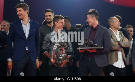 Munich, Germany. 14th May, 2016. Joshua Kimmich holds The Meisterschale, the trophy of the German football championship and Robert Lewandowski holds his trophy for his 30 goals, becoming the 2015-16 Bundesliga top scorer during the FC Bayern Muenchen Bundesliga Champions Dinner at the Postpalast on May 14, 2016 in Munich, Bavaria. Stock Photo