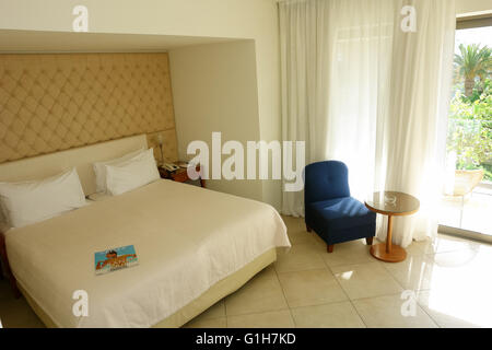 HERAKLION, CRETE, GREECE - MAY 13, 2014: The Interior room in modern building of villa with balconies in luxury class hotel Stock Photo