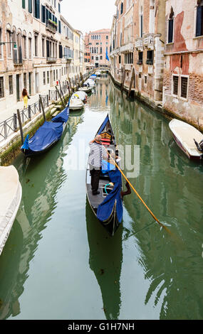 Gondola navigating down the Rio de San Severo, Castello, Venice, Veneto, Italy Stock Photo