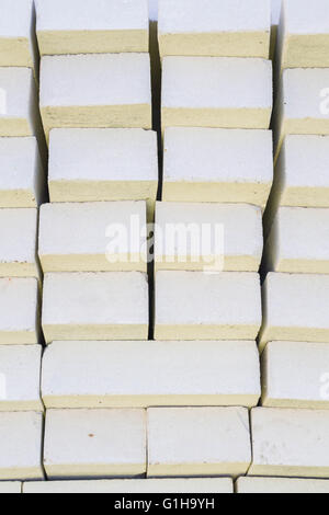 Building material brick for sale on open basis of the building Stock Photo