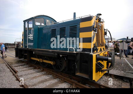 Diesel and steam locomotives in a yard Stock Photo