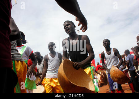 Traditional dancers entertain guests in Kampala, Uganda. Music and dance are very crucial elements of African society. Stock Photo