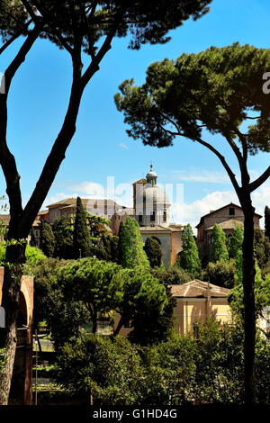 Ancient basilica church Santi Giovanni e Paolo located on the Caelian Hill, view from Roman Forum, Roma, Italy Stock Photo