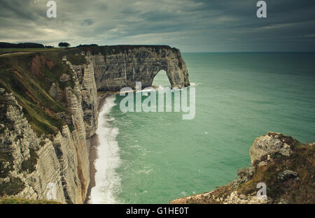 The Manneporte Cliff arch at the coast near Etretat in Normandy, France ...