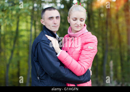 The guy and the girl on walk Stock Photo