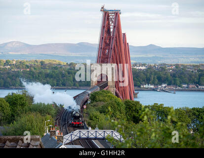 The Flying Scotsman steam train arriving at North Queensferry station after crossing the Forth Rail Bridge on a trip to Fife, Stock Photo