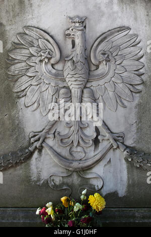 Coat of arms of Poland depicted in a tombstone at the Monumental Cemetery (Cimitero Monumentale di Milano) in Milan, Lombardy, Italy. Stock Photo