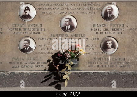 Commemorative plaques to Italian soldiers fallen during World War I at the Monumental Cemetery (Cimitero Monumentale di Milano) in Milan, Lombardy, Italy. Cenotaph to Angelo Cesati fallen at Altipiano di Asiago on August 26, 1915, to Angelo Barbieri fallen at Travolto da Valanga on July 13, 1916, to Pietro Bianchi fallen at Trentino on July 13, 1916, to Angelo Pavia fallen at Cave di Selz on May 4, 1916, and to Carlo Pirotta fallen at Altipiano di Asiago on August 26, 1913. Stock Photo