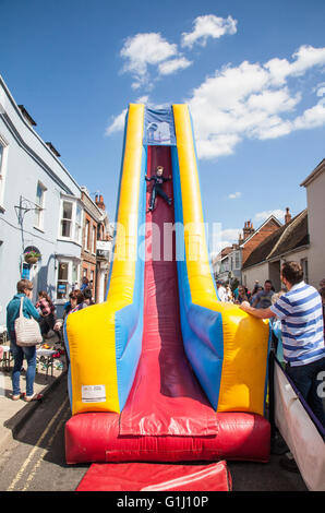 Inflatable kids slide at the Alresford watercress festival 2016, New Alresford, Hampshire, England, United Kingdom. Stock Photo