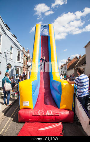 Inflatable kids slide at the Alresford watercress festival 2016, New Alresford, Hampshire, England, United Kingdom. Stock Photo