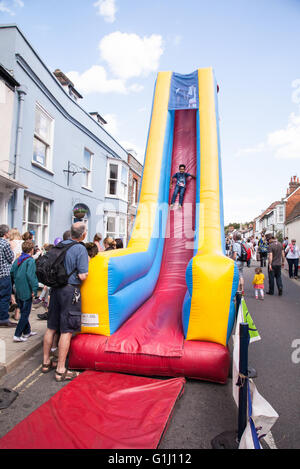 Inflatable kids slide at the Alresford watercress festival 2016, New Alresford, Hampshire, England, United Kingdom. Stock Photo