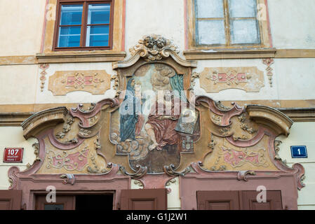 Fresco on wall of U Cerneho Vola (The Black Ox) at Loretanska street, Prague, Czech Republic, Europe Stock Photo