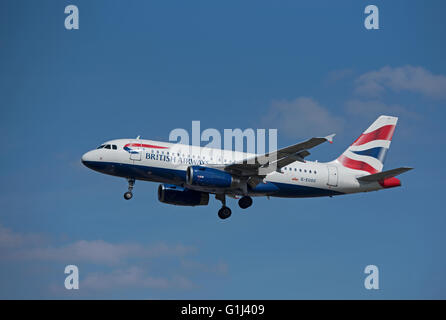 British Airways Airbus Civil Passenger Aircraft A 319-131 Reg (G-EUOC) coming into LHR London Heathrow.  SCO 10,375. Stock Photo