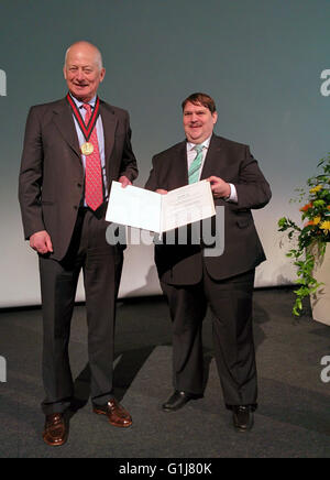 Norimberk, Germany. 14th May, 2016. Hans-Adam II, Prince of Liechtenstein, left, receives the highest award from Sudeten German Homeland Association (SL), the European Charles IV Prize, from hands of SL chairman Bernd Posselt, right, at the Sudeten German congress in Nuremberg, Germany, May 14, 2016. © Jakub Strihavka/CTK Photo/Alamy Live News Stock Photo