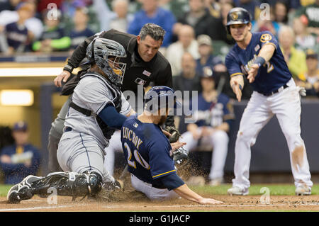May 14, 2016: Milwaukee Brewers catcher Jonathan Lucroy #20 slides safely into home plate as San Diego Padres catcher Hector Sanchez #44 tries to apply the tag in the Major League Baseball game between the Milwaukee Brewers and the San Diego Padres at Miller Park in Milwaukee, WI. John Fisher/CSM Stock Photo