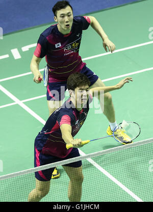 Kunshan, China's Jiangsu Province. 17th May, 2016. Lee Yong Dae (Front) and Yoo Yeon Seong of South Korea compete during the men's doubles match against Goh V Shem and Koo Kien Keat of Malaysia in the Group C match at the Thomas Cup badminton championship in Kunshan, east China's Jiangsu Province, May 17, 2016. Lee Yong Dae and Yoo Yeon Seong won 2-0. © Yang Lei/Xinhua/Alamy Live News Stock Photo