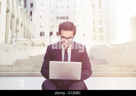 Businessman using laptop computer Stock Photo