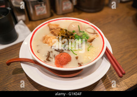 A bowl of Japanese styled soup on table Stock Photo